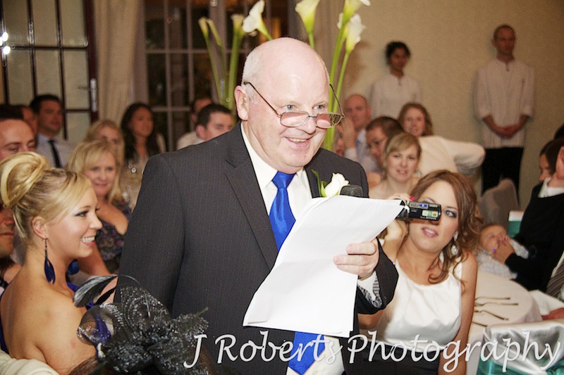 Father of the bride singing during wedding reception - wedding photography sydney